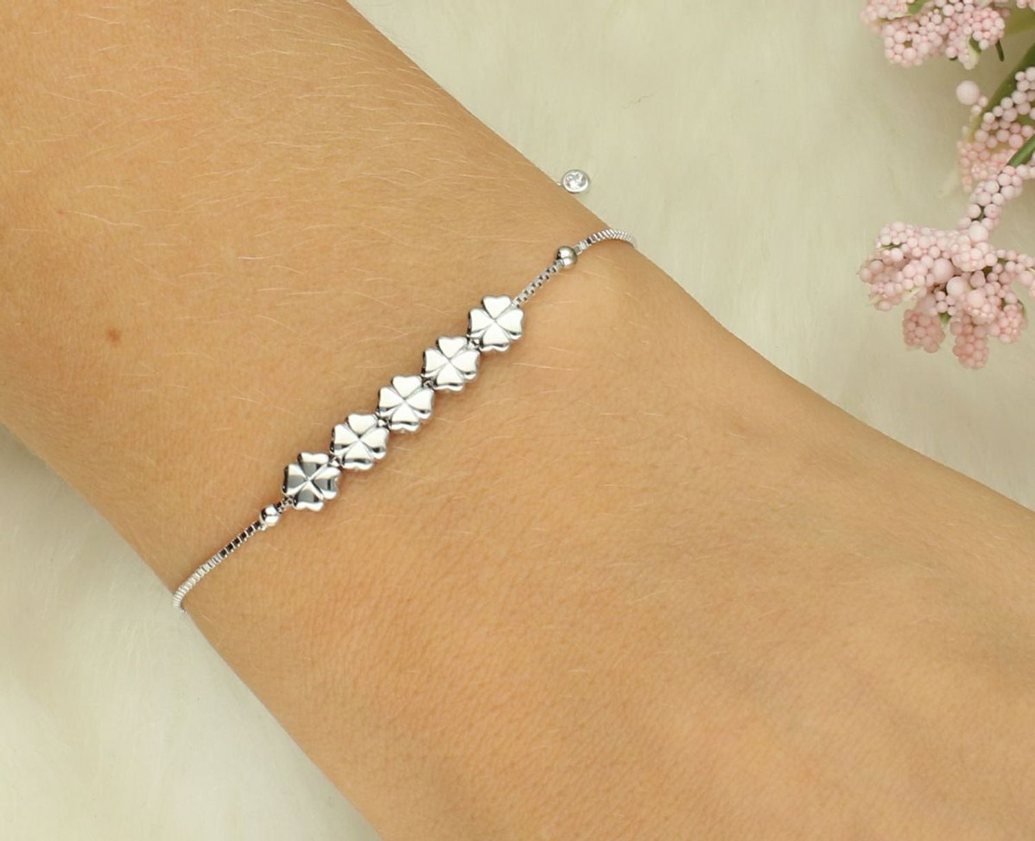 Bransoletka damska srebrna z koniczynkami Armonica Nomination 241303 001.png